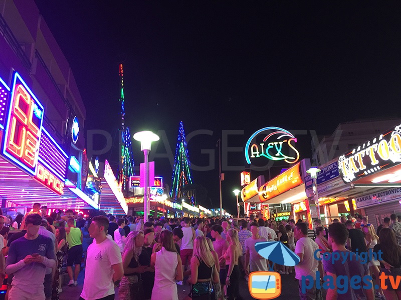 Busy street of Magaluf in Majorca in the summer evening